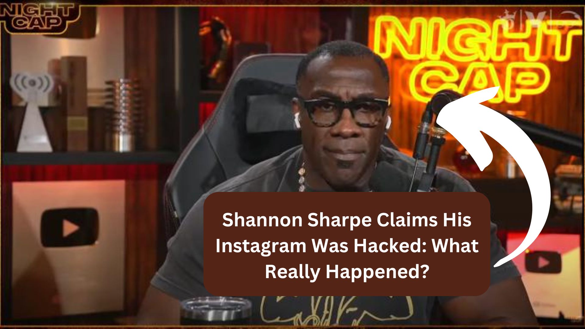 Shannon Sharpe speaking at a sports event, reflecting his social media presence and the hacking incident.